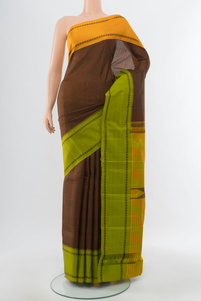 Coffee Brown Kanchipuram Silk Saree with Zari Butta on the body and Silk Border.  displayed on a mannequin