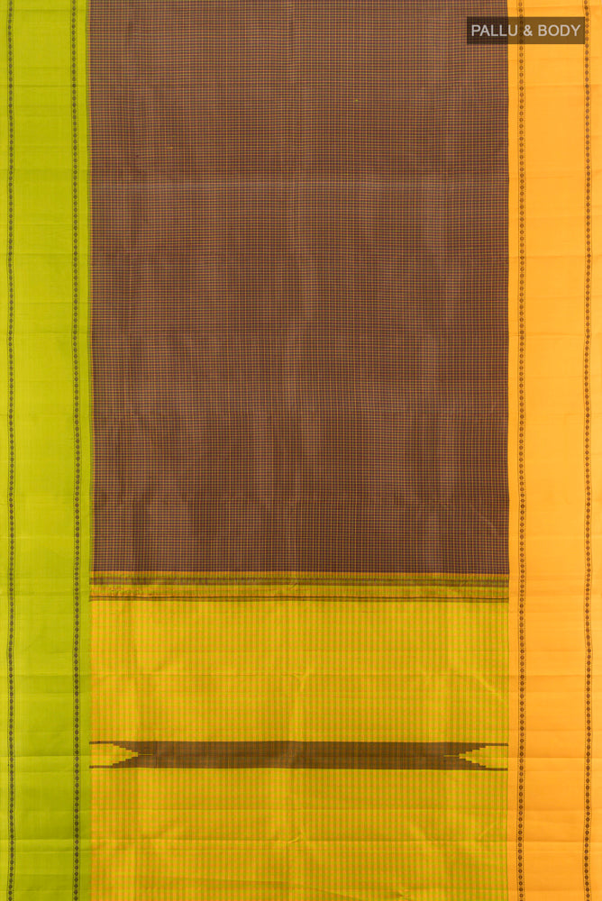 Flat view of Coffee Brown Kanchipuram Silk Saree with Zari Butta on the body and Silk Border. 