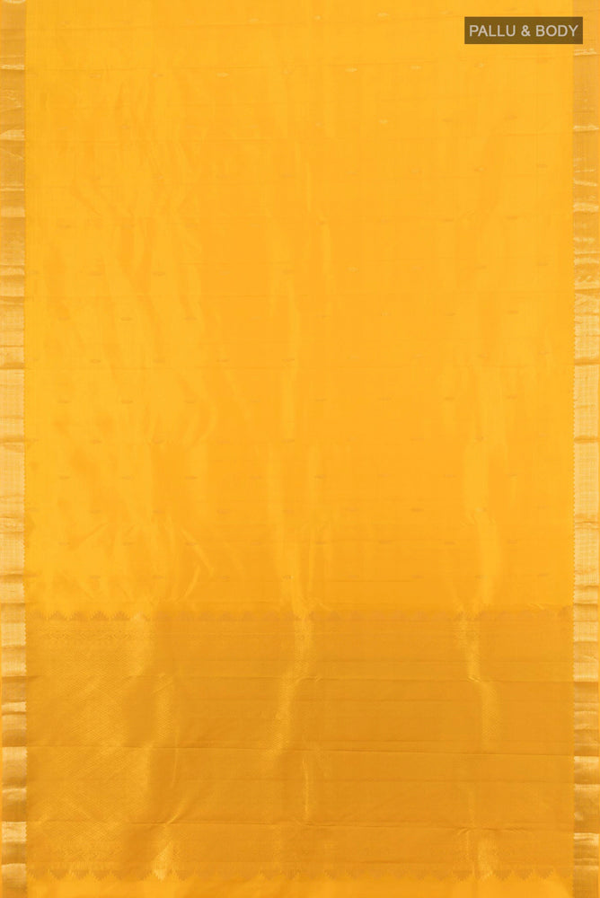 Flat view of Pure Silk Pure Zari Yellow Kanjivaram Saree with Zari Butta on the body and Silk Border. 