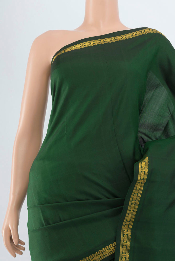Border image of Pure Silk Pure Zari Bottle Green Kanjivaram Saree with Zari Butta on the body and Silk Border. 
