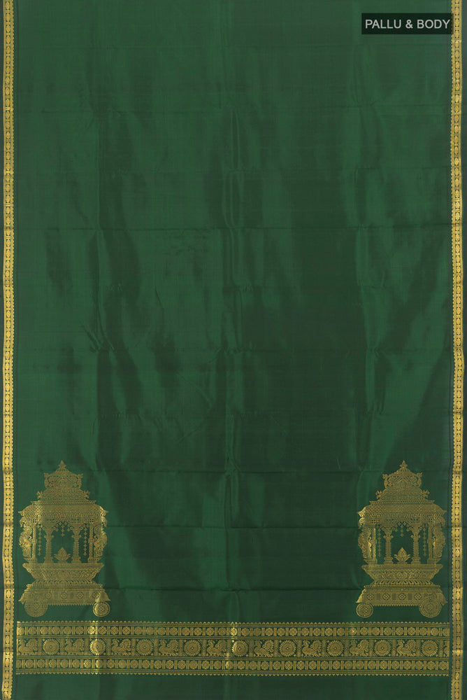 Flat view of Pure Silk Pure Zari Bottle Green Kanjivaram Saree with Zari Butta on the body and Silk Border. 
