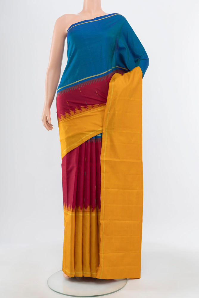 Pure Silk Pure Zari Multi Color Kanchipuram Saree with Zari Brocade on the body and Silk Border.  displayed on a mannequin