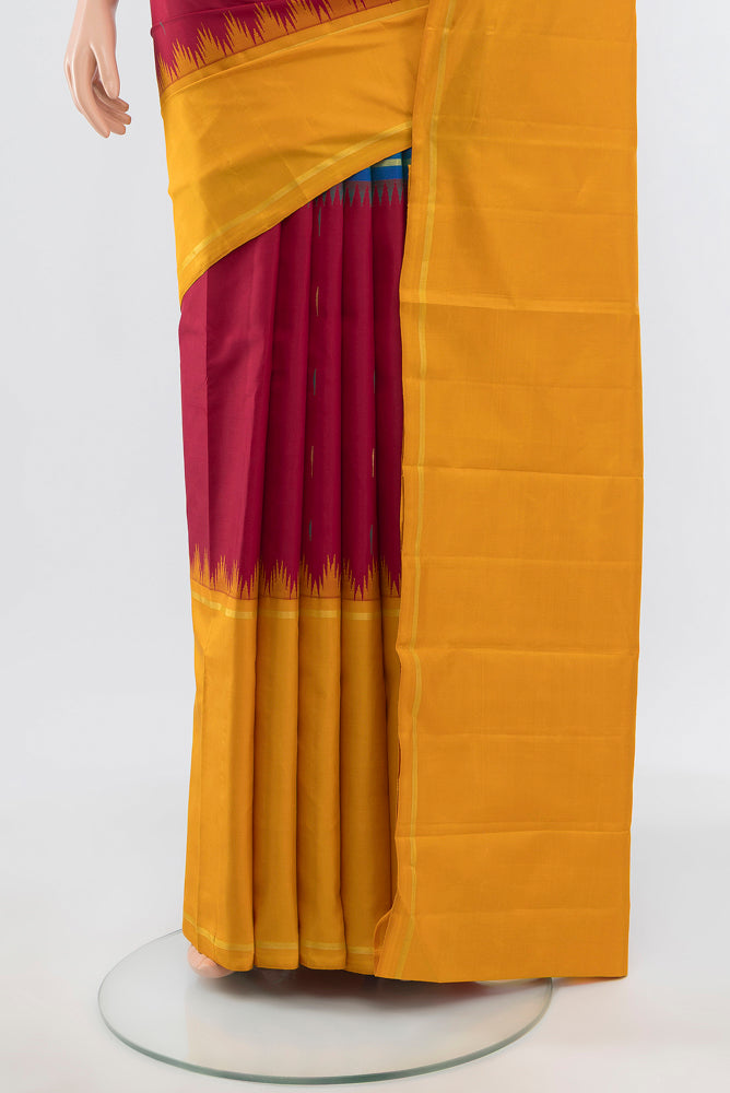 Pleats and pallu of Pure Silk Pure Zari Multi Color Kanchipuram Saree with Zari Brocade on the body and Silk Border. 