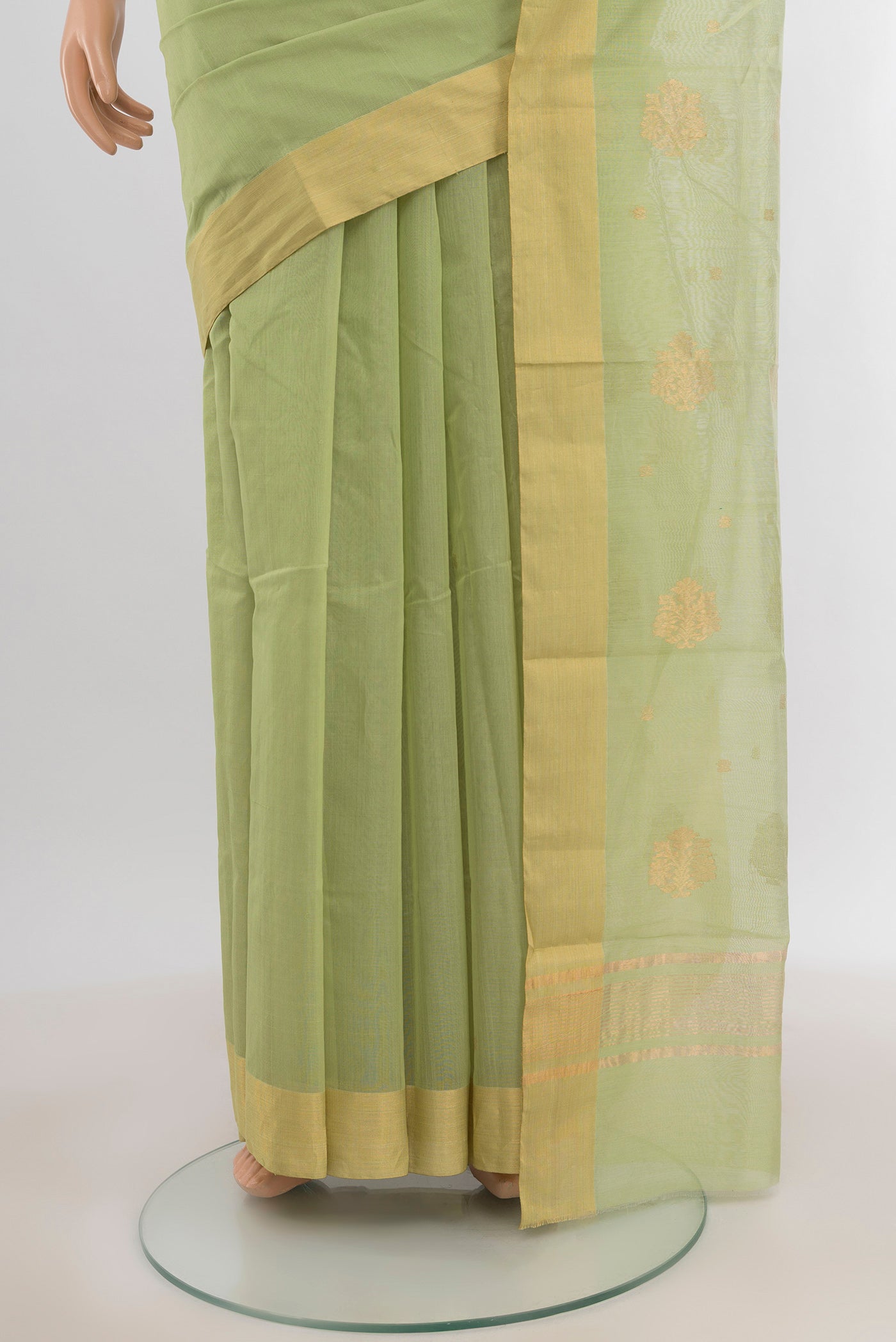 Pleats and pallu of Pista Green Chanderi Silk Cotton Saree with Zari Butta on the body and Zari Border. 