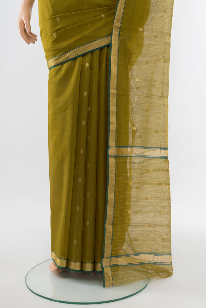 Pleats and pallu of Mehandi Green Chanderi Silk Cotton Saree with Zari Butta on the body and Silk Border. 