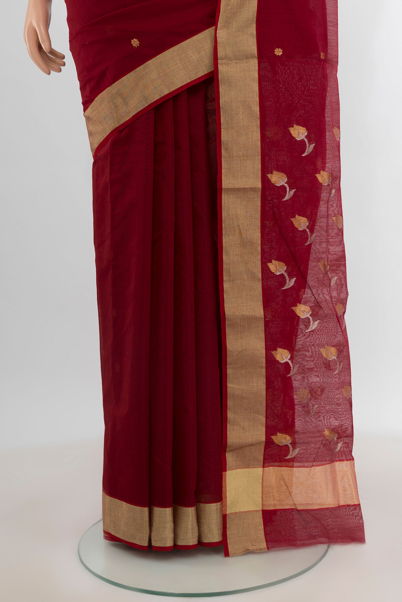 Pleats and pallu of Maroon Chanderi Silk Cotton Saree with Zari Butta on the body and Zari Border. 
