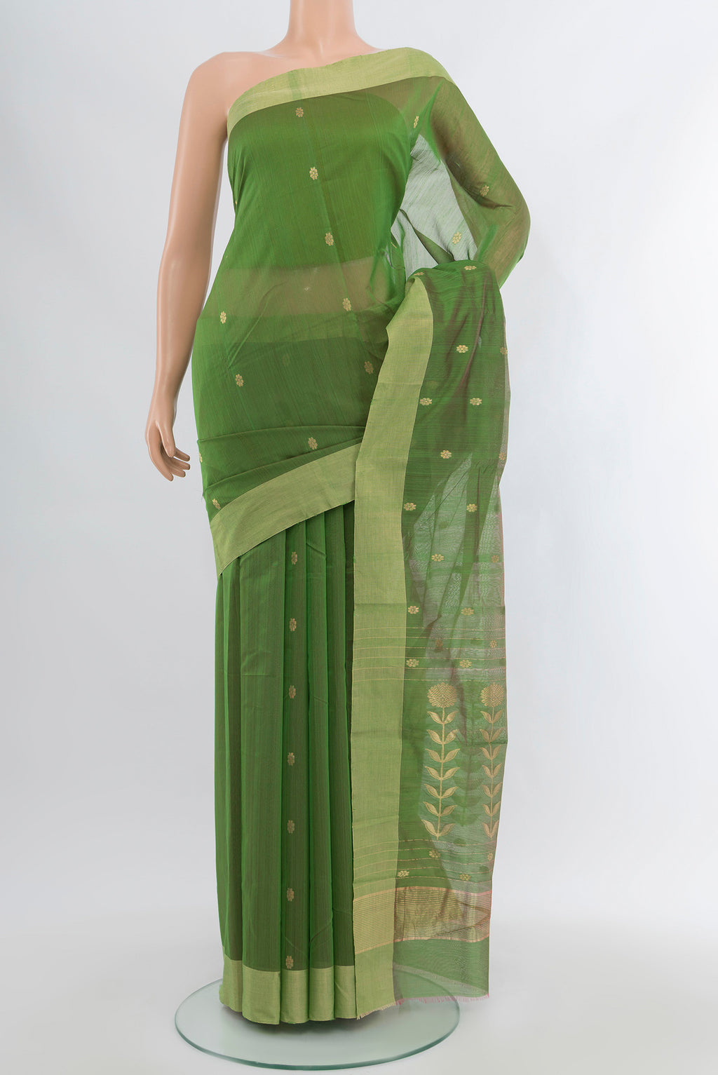 Light Green Chanderi Silk Cotton Saree with Zari Butta on the body and Zari Border.  displayed on a mannequin