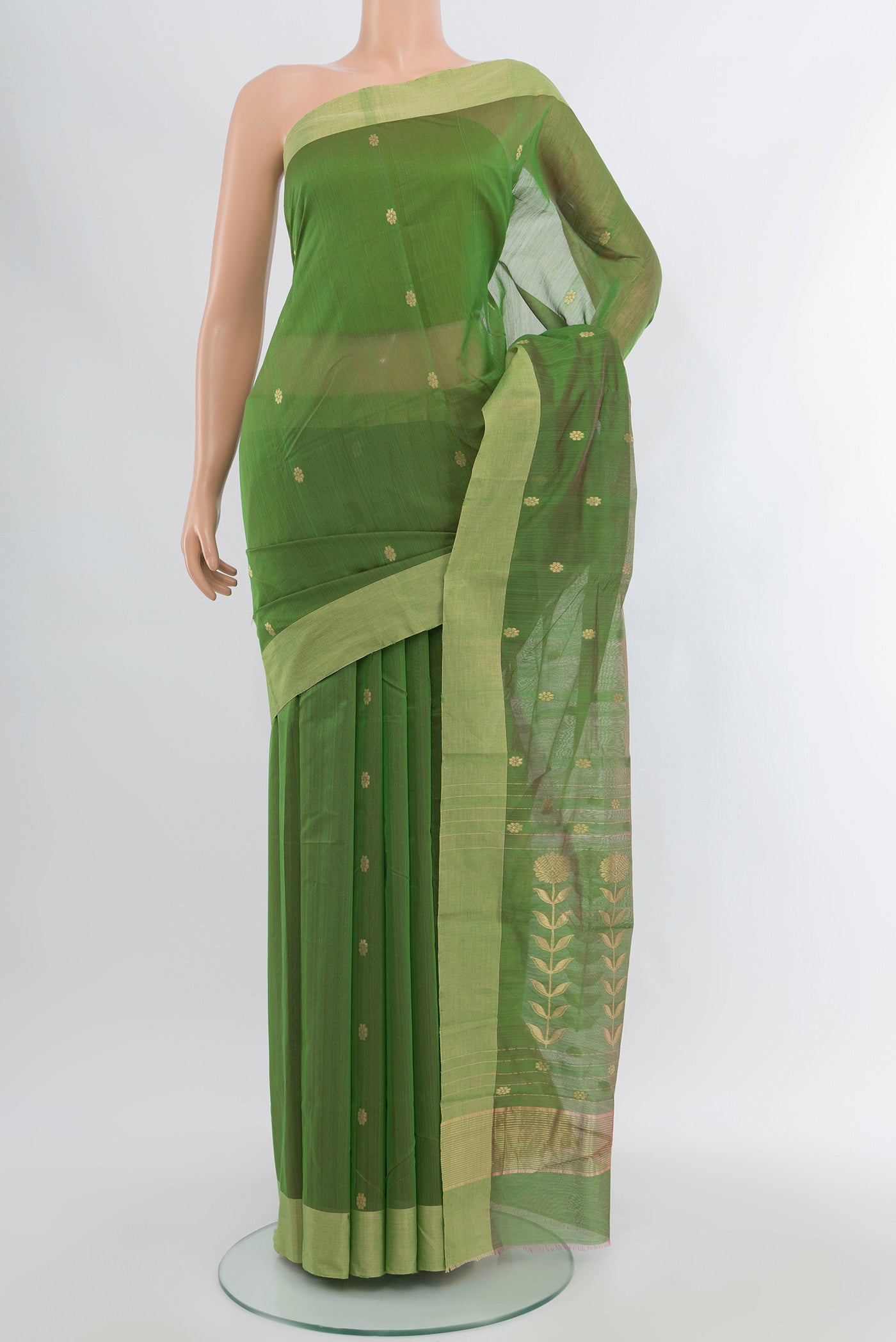 Light Green Chanderi Silk Cotton Saree with Zari Butta on the body and Zari Border.  displayed on a mannequin