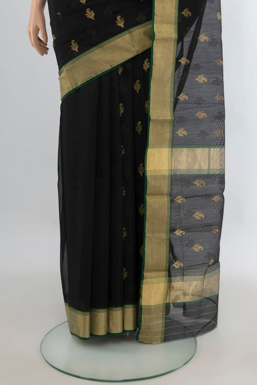 Pleats and pallu of Black Chanderi Cotton Saree with Zari Butta on the body and Zari Border. 