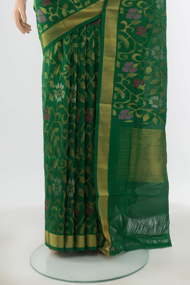 Pleats and pallu of Bottle Green Uppada Silk Saree with Zari Butta on the body and Silk Border. 
