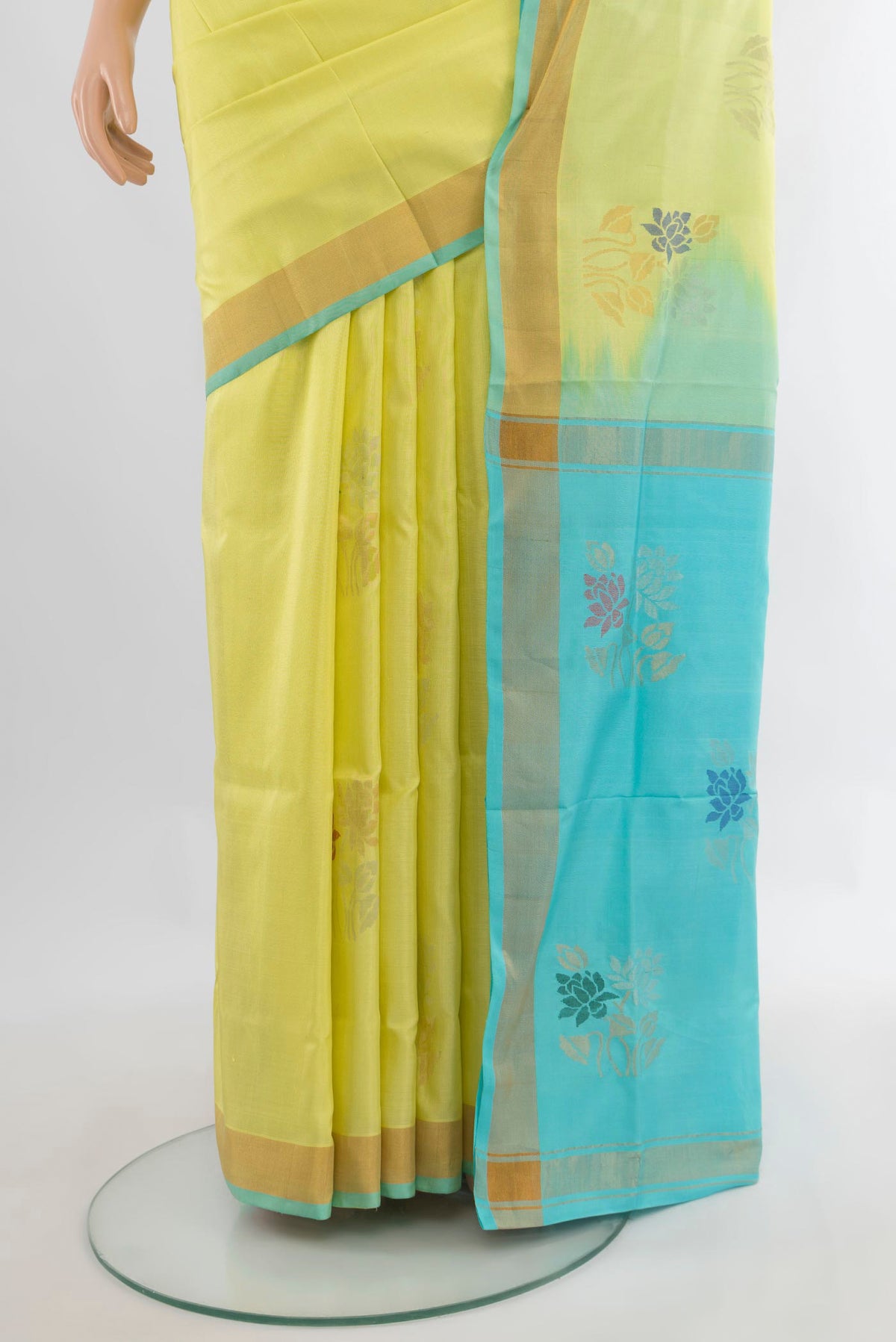 Pleats and pallu of Pure Silk Lemon Yellow Uppada Saree with Zari And Thread Butta on the body and Zari Border. 