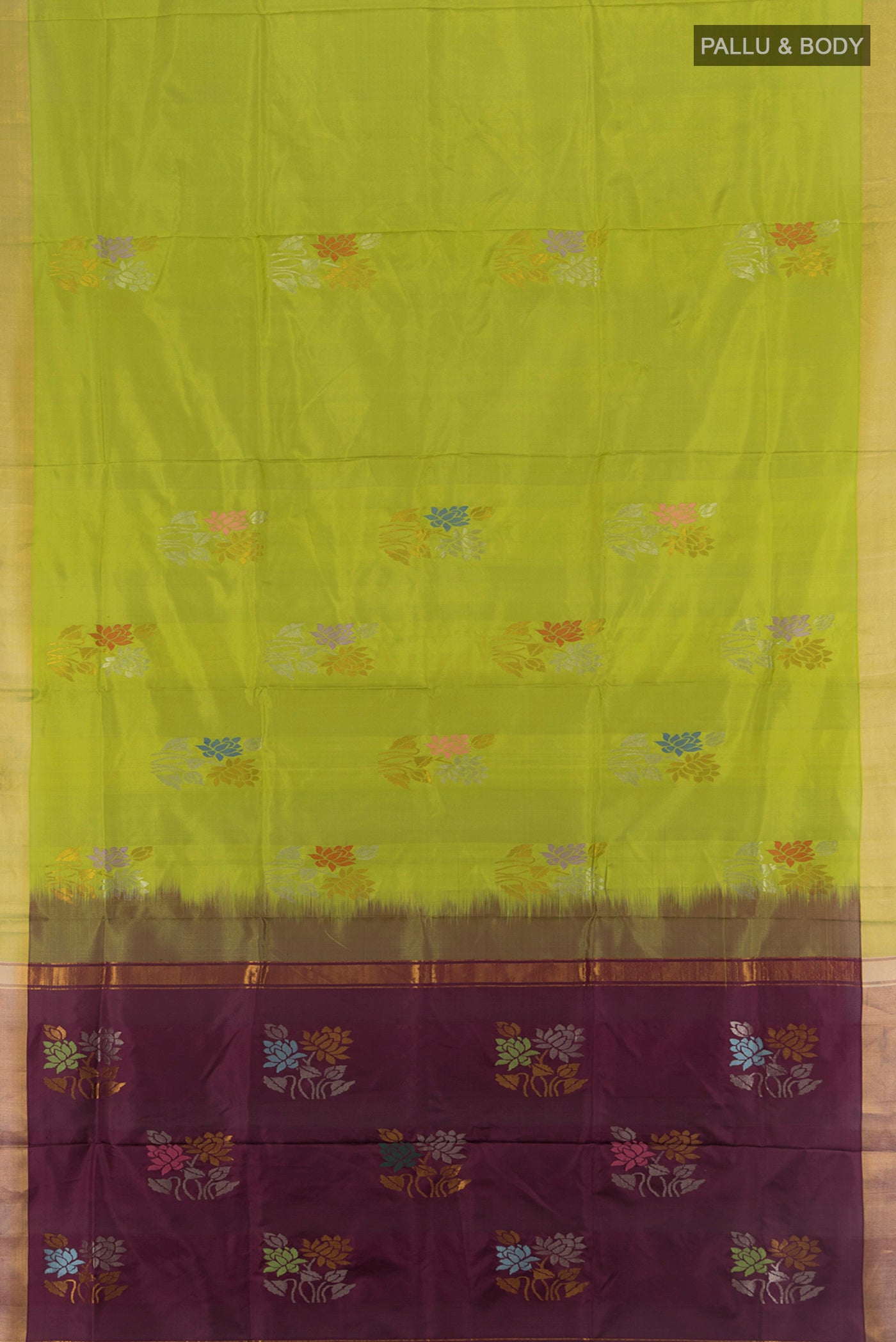 Flat view of Light Green Uppada Silk Saree with Zari Butta on the body and Silk Border. 
