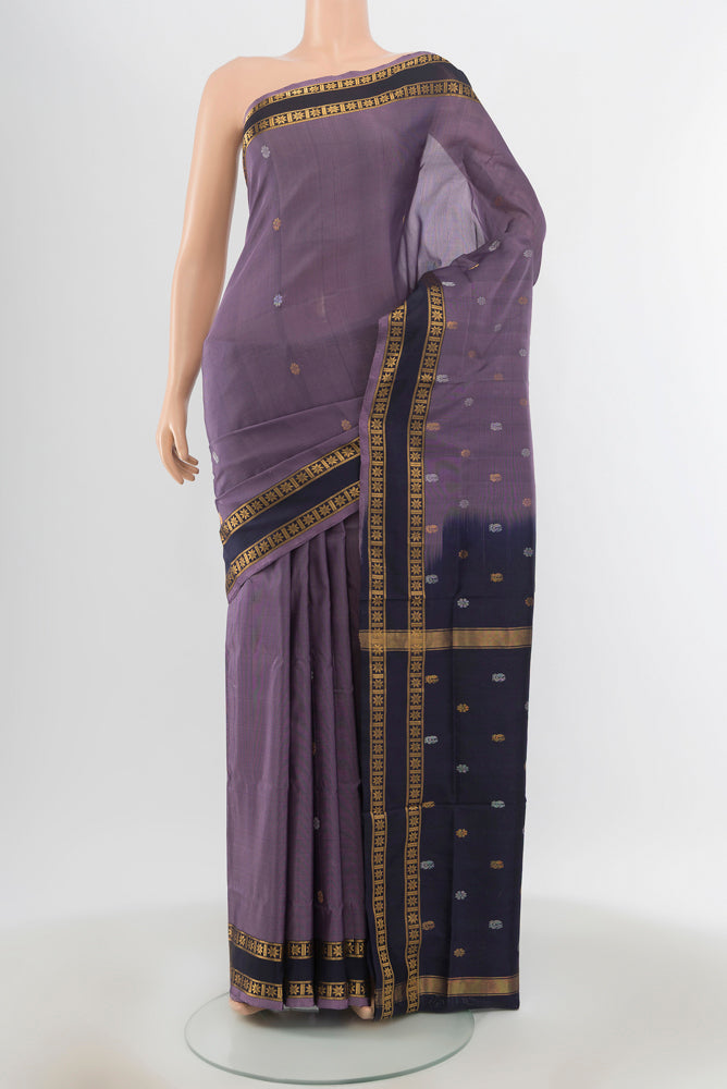 Pure Silk Pure Zari Davys Grey Uppada Saree with Zari Butta on the body and Silk Border.  displayed on a mannequin