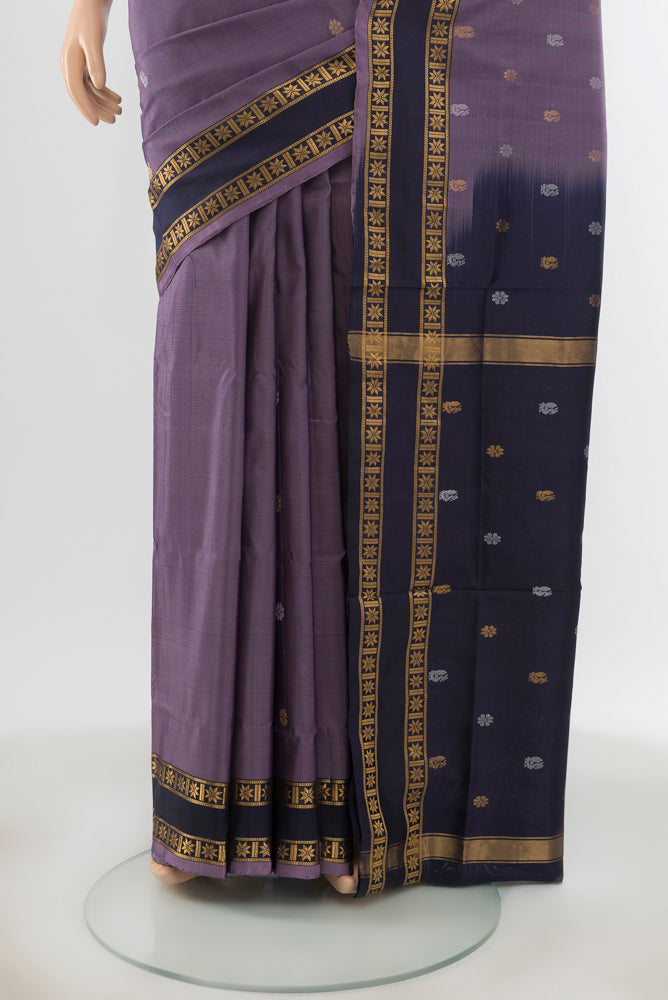 Pleats and pallu of Pure Silk Pure Zari Davys Grey Uppada Saree with Zari Butta on the body and Silk Border. 