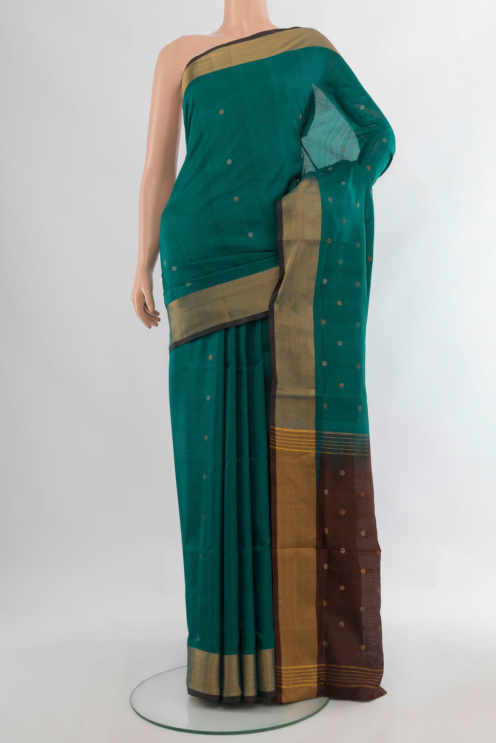 Pure Silk Green Uppada Saree with Zari Butta on the body and Zari Border.  displayed on a mannequin