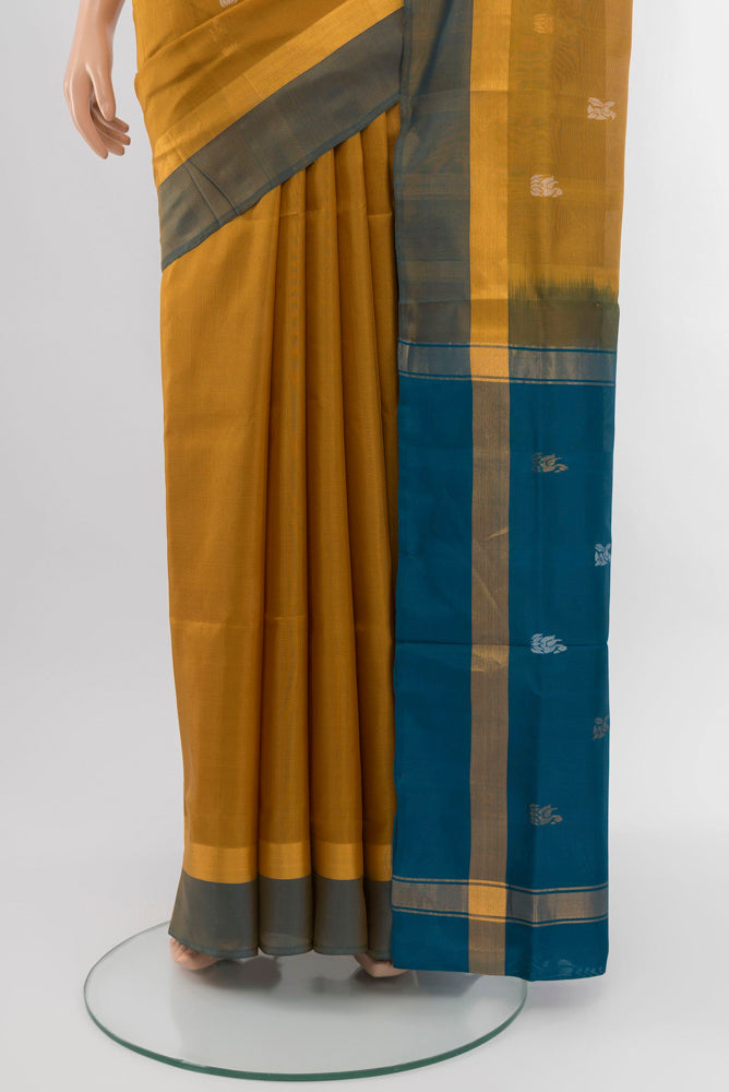 Pleats and pallu of Golden Uppada Silk Saree with Zari Butta on the body and Silk Border. 