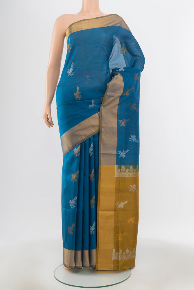 Pure Silk Pure Zari Dark Blue Uppada Saree with Zari Butta on the body and Silk Border.  displayed on a mannequin