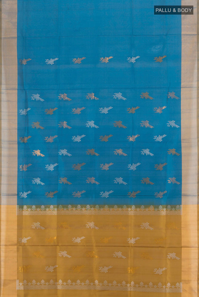 Flat view of Pure Silk Pure Zari Dark Blue Uppada Saree with Zari Butta on the body and Silk Border. 