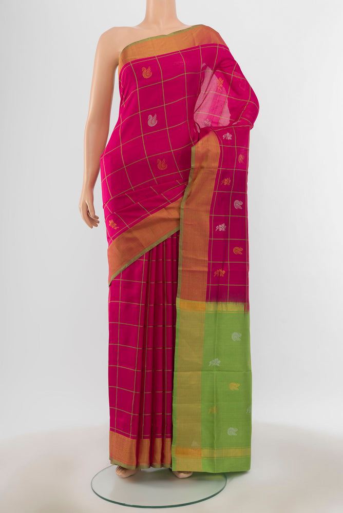 Pure Silk Pure Zari Dark Pink Uppada Saree with Zari Butta on the body and Silk Border.  displayed on a mannequin