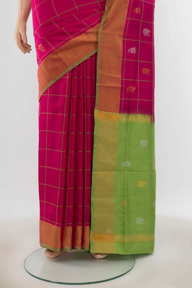 Pleats and pallu of Pure Silk Pure Zari Dark Pink Uppada Saree with Zari Butta on the body and Silk Border. 