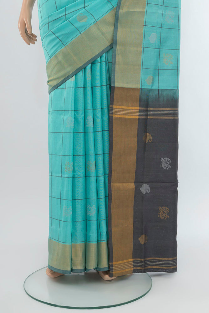 Pleats and pallu of Sky Blue Uppada Silk Saree with Zari Butta on the body and Zari Border. 