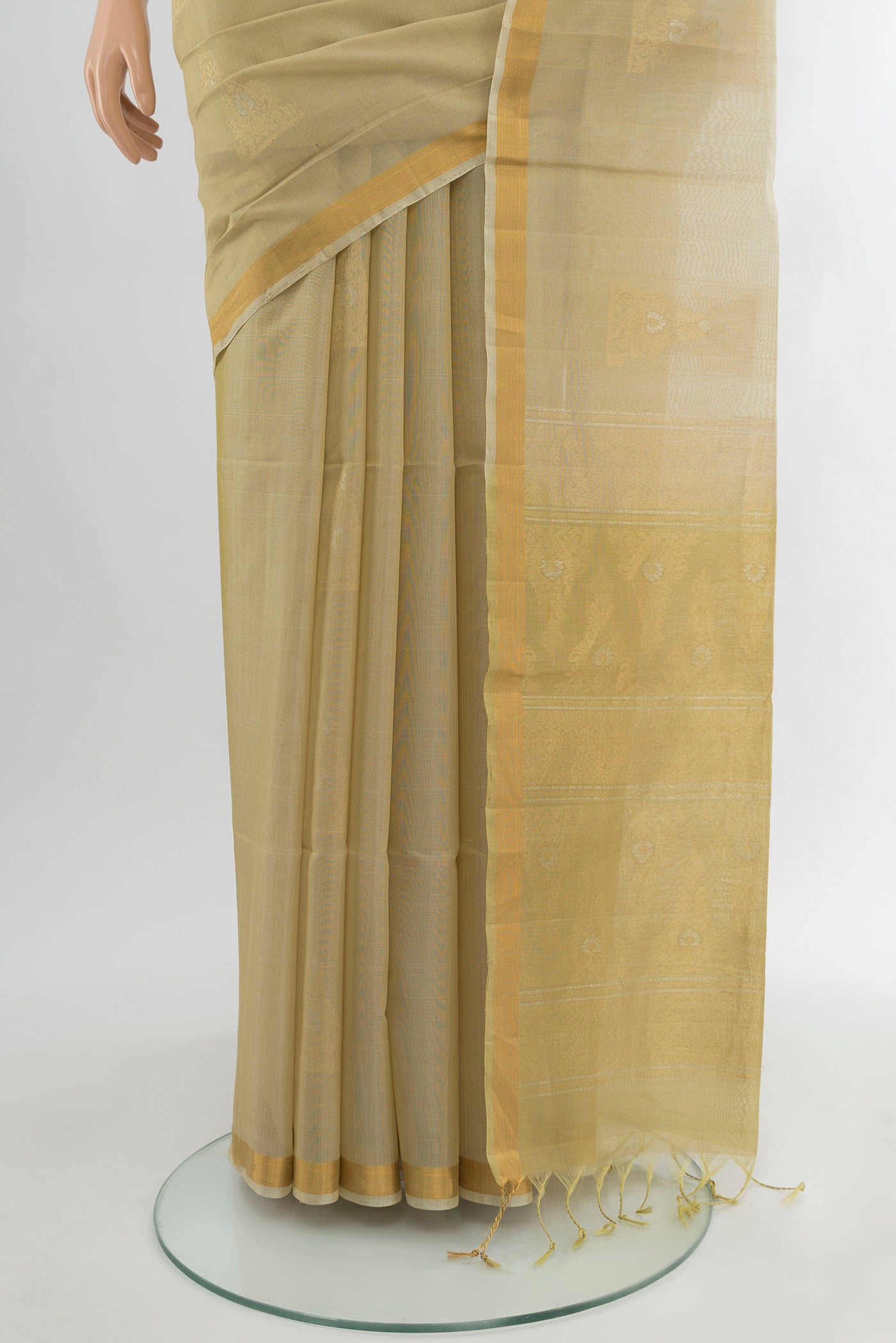 Pleats and pallu of Beige Silk Cotton Saree with Zari Butta on the body and Zari Border. 