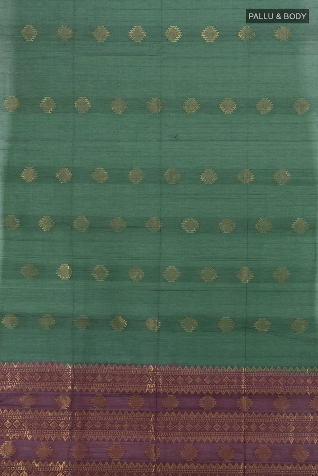 Flat view of Bottle Green Silk Cotton Saree with Zari Butta on the body and Zari Border. 