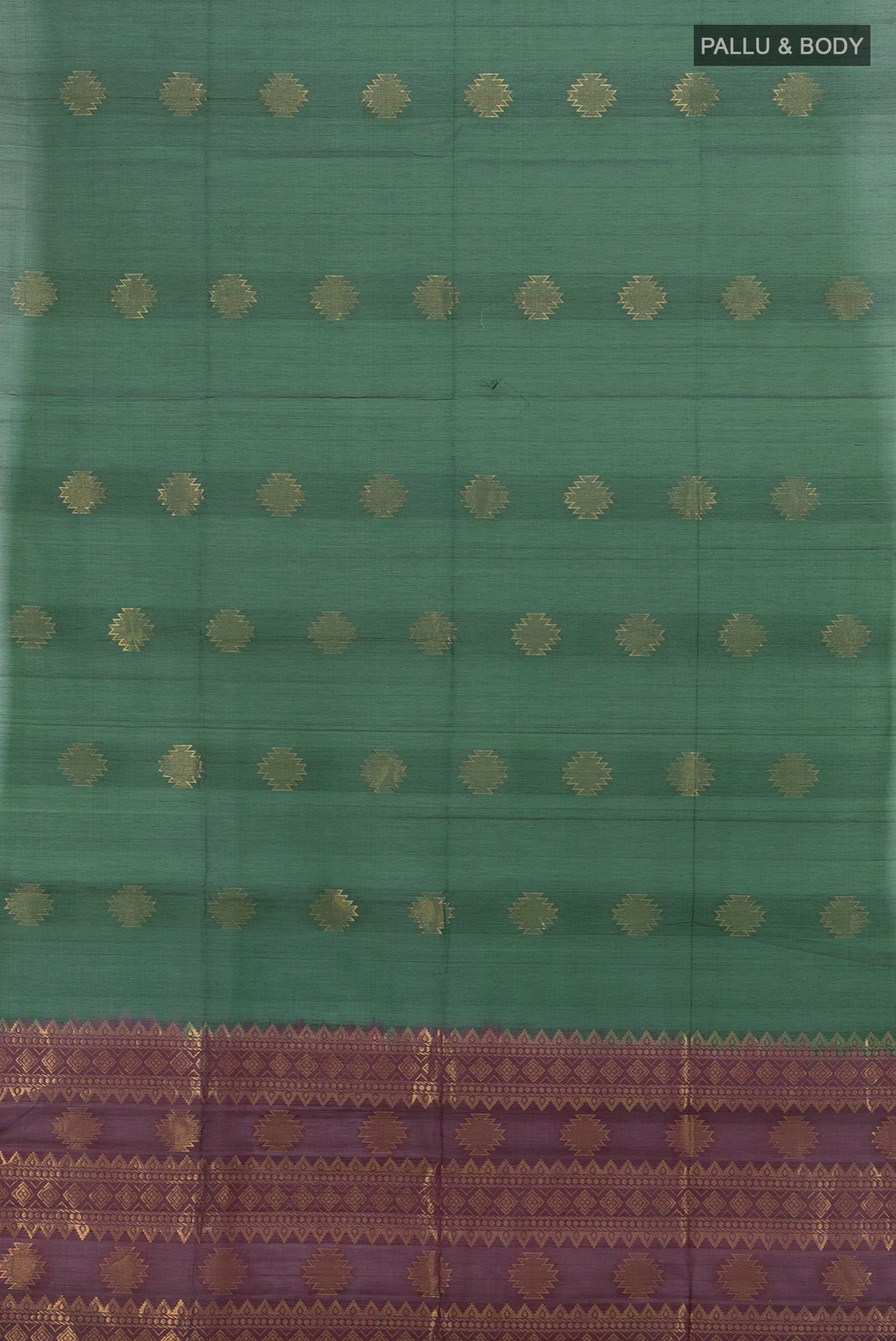 Flat view of Bottle Green Silk Cotton Saree with Zari Butta on the body and Zari Border. 