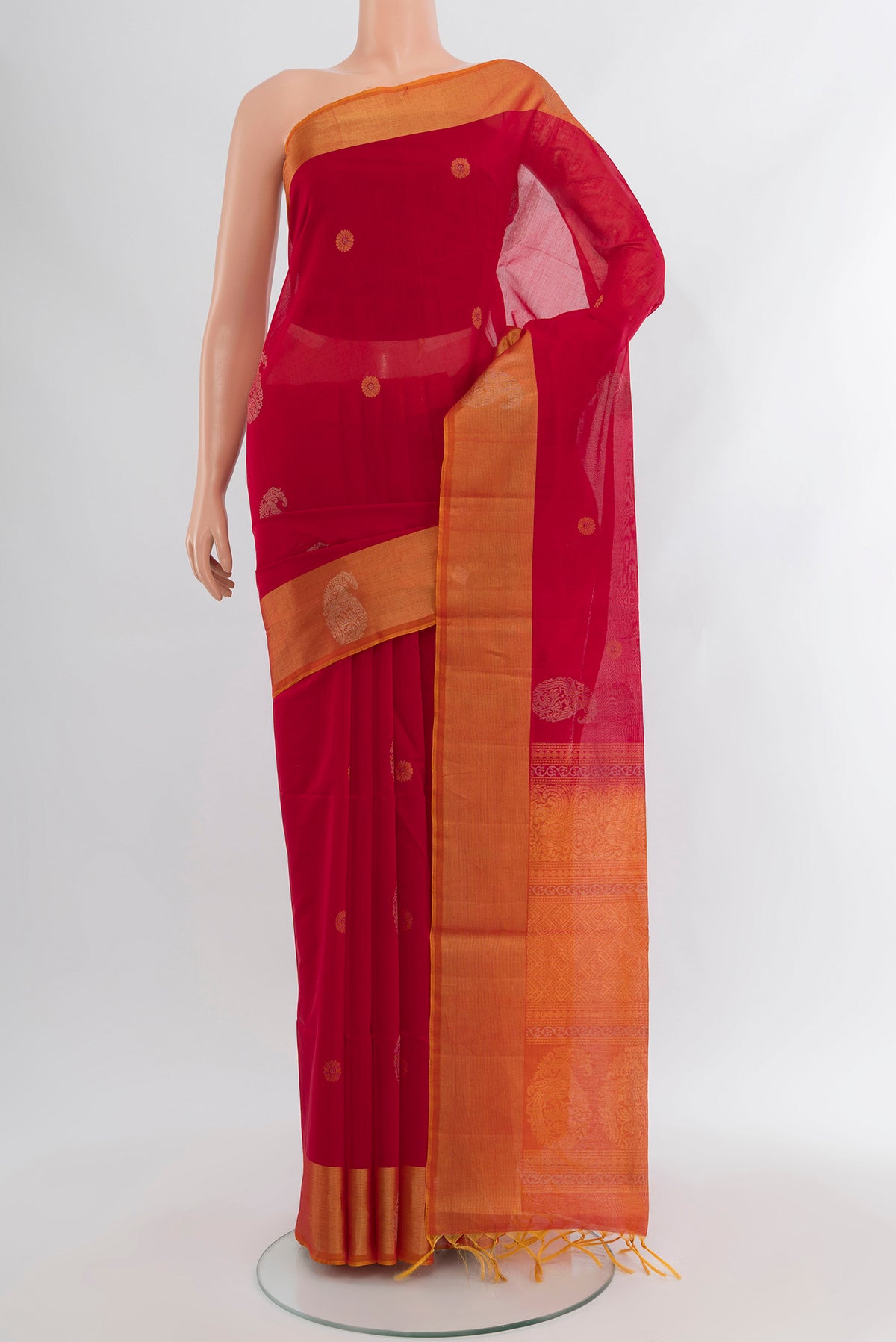 Red Silk Cotton Saree with Zari Butta on the body and Zari Border.  displayed on a mannequin