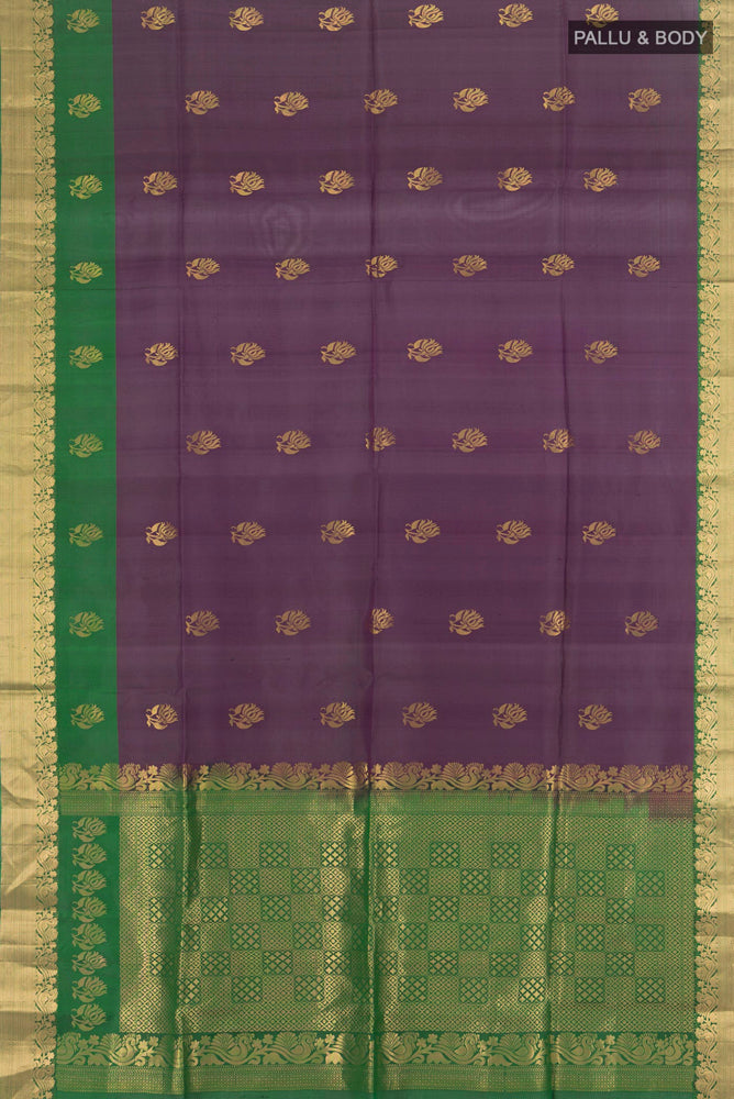 Flat view of Pure Silk Pure Zari Violet Soft Saree with Zari Butta on the body and Silk Border. 