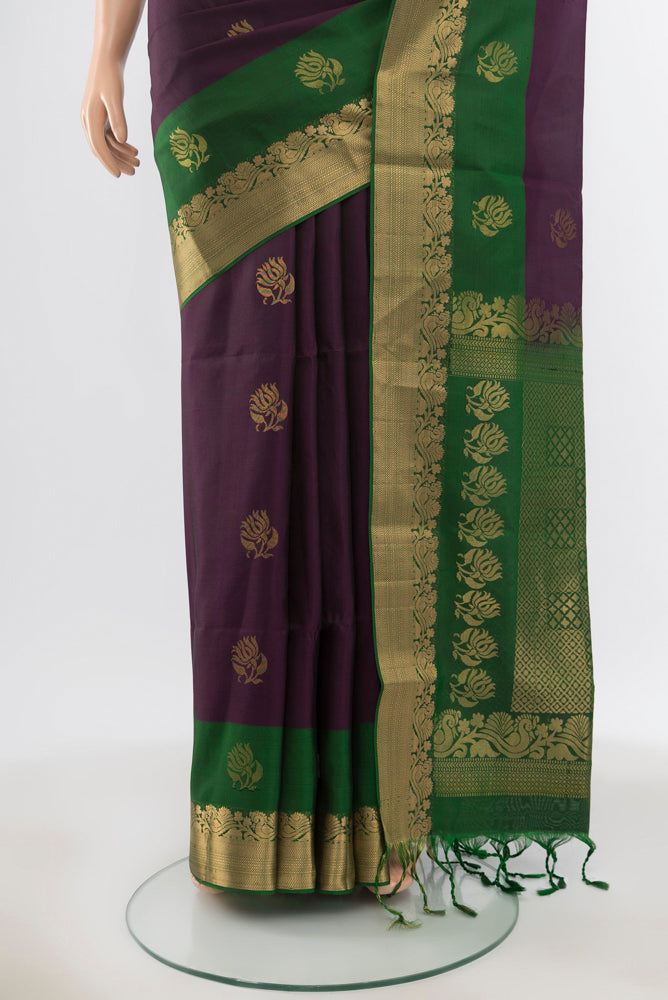 Pleats and pallu of Pure Silk Pure Zari Violet Soft Saree with Zari Butta on the body and Silk Border. 