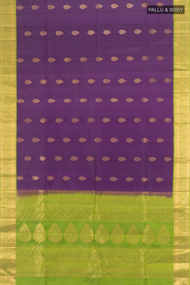 Flat view of Pure Silk Pure Zari Violet Soft Saree with Zari Butta on the body and Silk Border. 