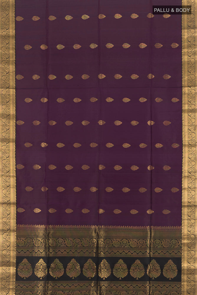 Flat view of Violet Soft Silk Saree with Zari Butta on the body and Silk Border. 