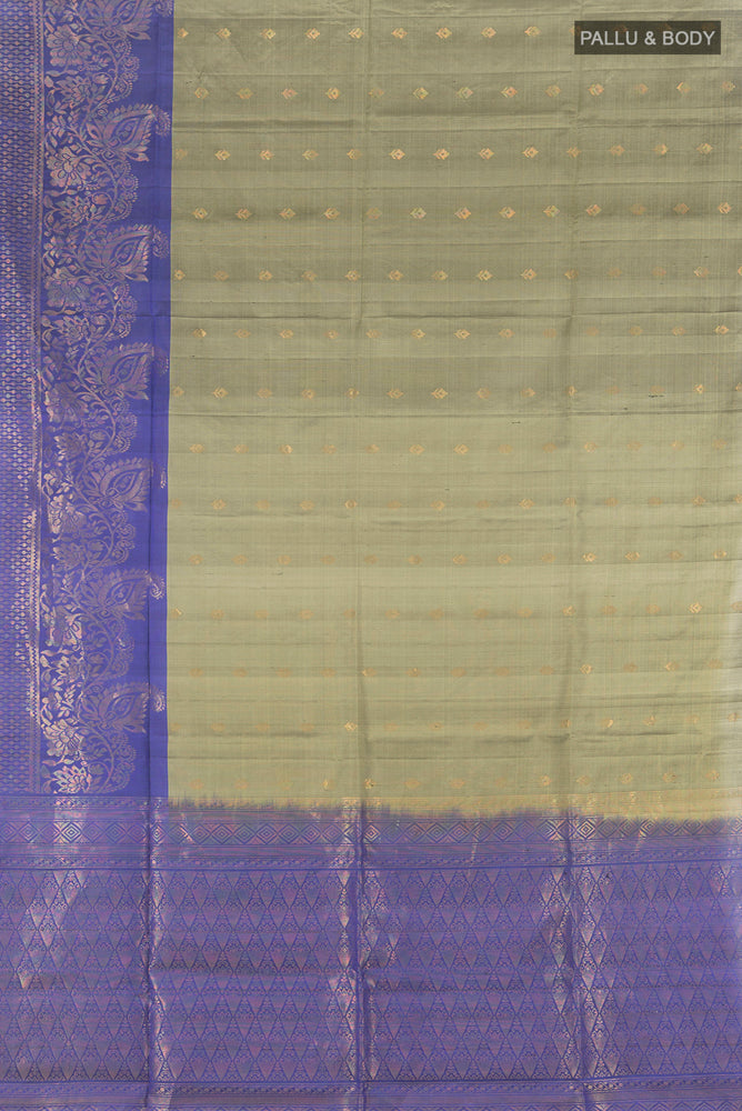 Flat view of Pure Silk Pure Zari Davys Grey Soft Saree with Zari Butta on the body and Silk Border. 