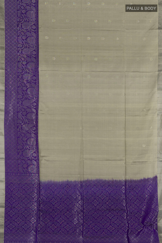 Flat view of Davys Grey Soft Silk Saree with Zari Butta on the body and Silk Border. 