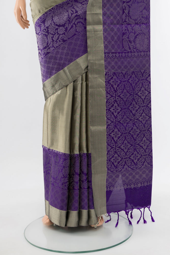 Pleats and pallu of Davys Grey Soft Silk Saree with Zari Butta on the body and Silk Border. 