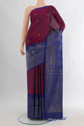 Pure Silk Purple Soft Saree with Zari Butta on the body and Fancy Border.  displayed on a mannequin