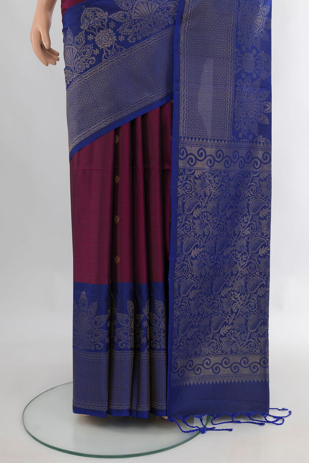Pleats and pallu of Pure Silk Purple Soft Saree with Zari Butta on the body and Fancy Border. 