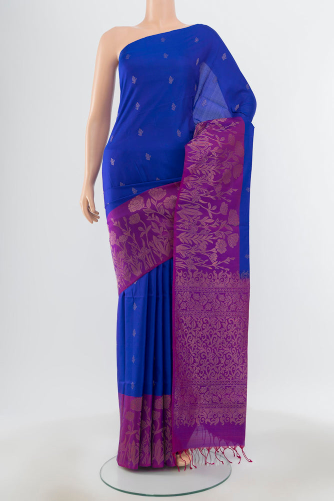 Pure Silk Pure Zari Dark Blue Soft Saree with Zari Butta on the body and Silk Border.  displayed on a mannequin