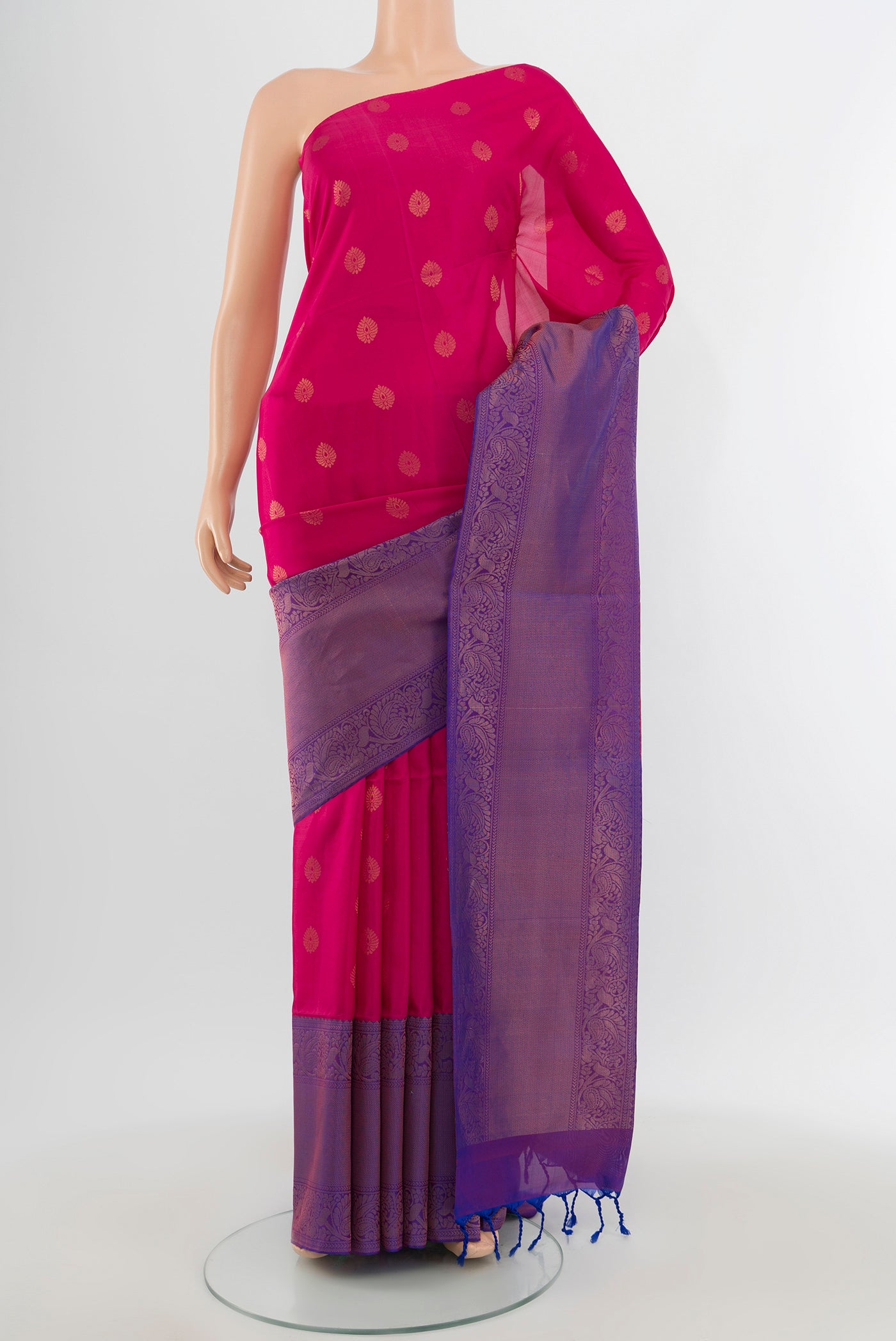 Dark Pink Soft Silk Saree with Zari Butta on the body and Zari Border.  displayed on a mannequin