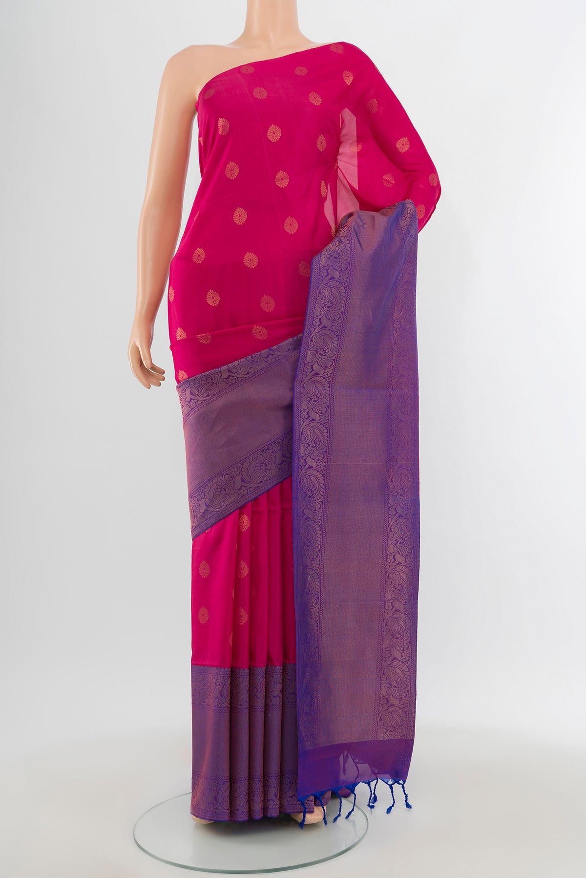 Dark Pink Soft Silk Saree with Zari Butta on the body and Zari Border.  displayed on a mannequin