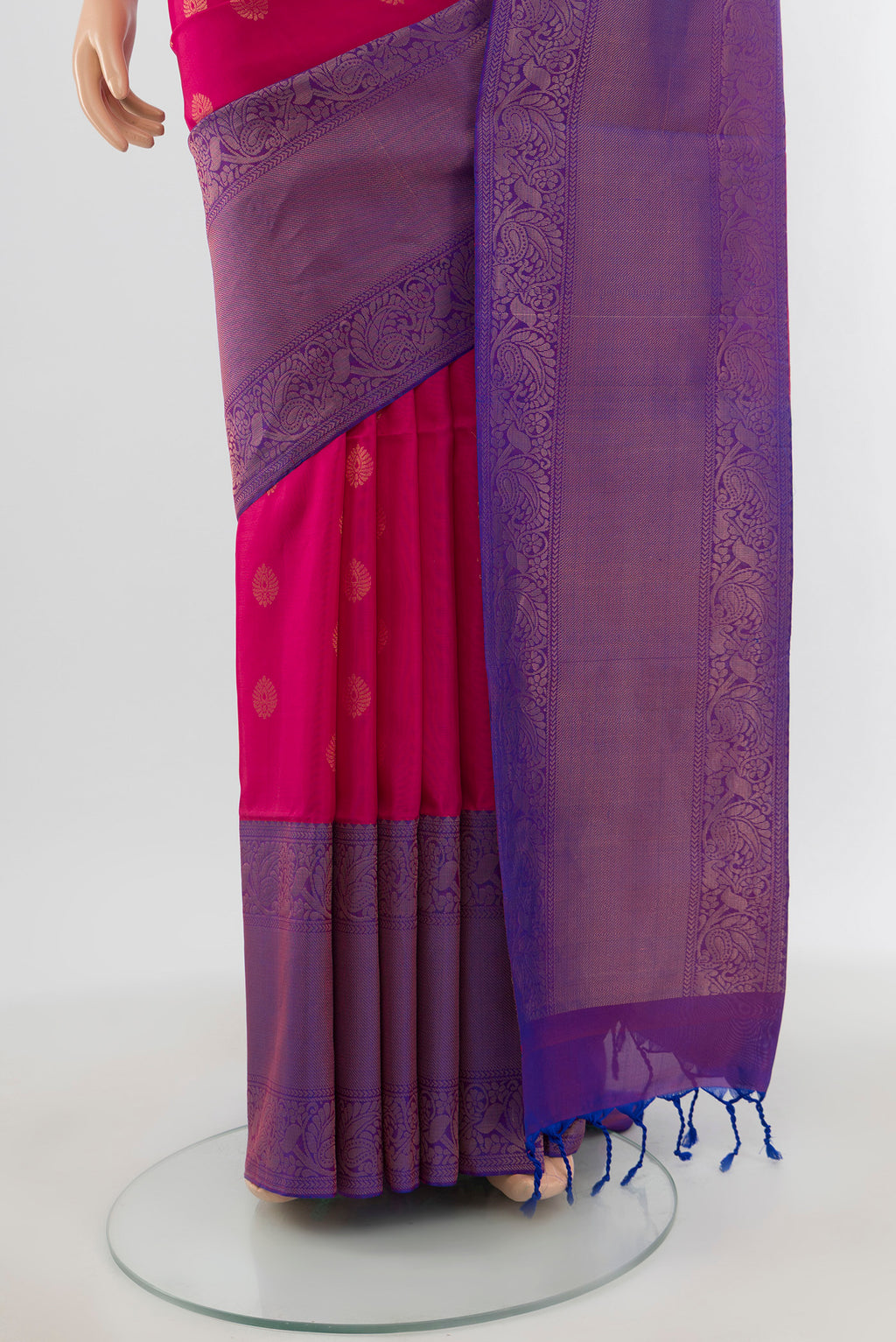 Pleats and pallu of Dark Pink Soft Silk Saree with Zari Butta on the body and Zari Border. 