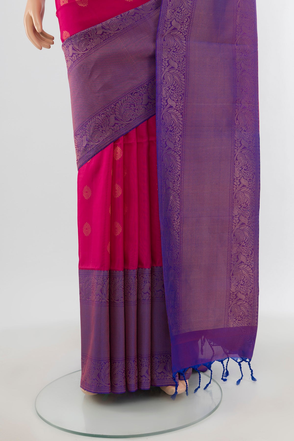 Pleats and pallu of Dark Pink Soft Silk Saree with Zari Butta on the body and Zari Border. 