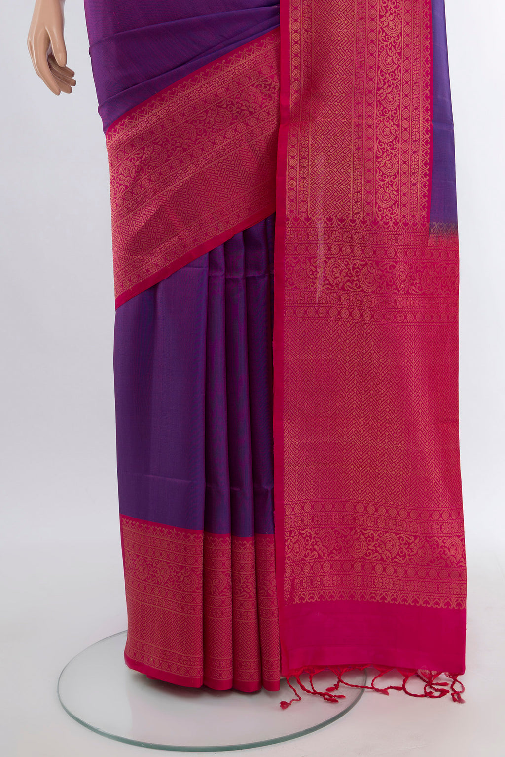 Pleats and pallu of Violet Soft Silk Saree with Zari Butta on the body and Silk Border. 