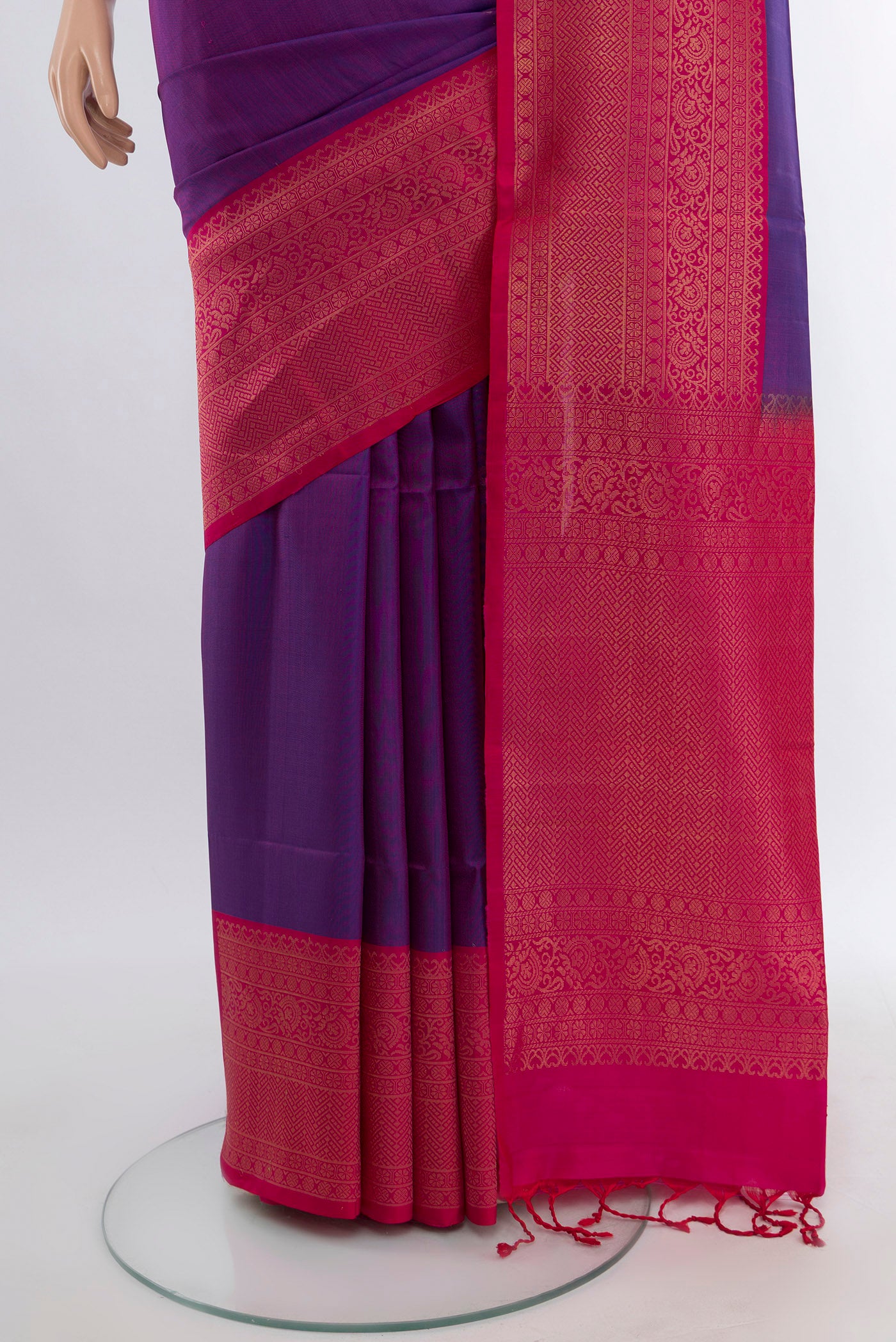 Pleats and pallu of Violet Soft Silk Saree with Zari Butta on the body and Silk Border. 