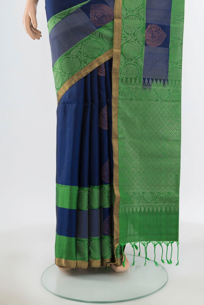 Pleats and pallu of Pure Silk Pure Zari Navy Blue Soft Saree with Zari Butta on the body and Silk Border. 
