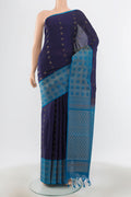 Navy Blue Soft Silk Saree with Zari Butta on the body and Silk Border.  displayed on a mannequin