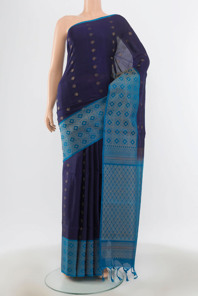 Navy Blue Soft Silk Saree with Zari Butta on the body and Silk Border.  displayed on a mannequin