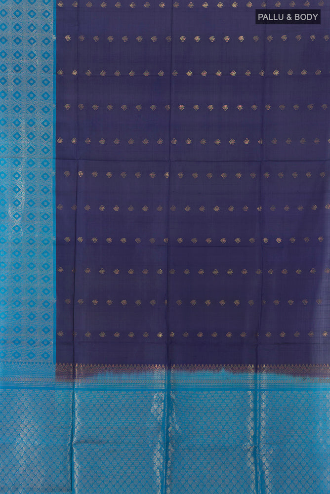 Flat view of Navy Blue Soft Silk Saree with Zari Butta on the body and Silk Border. 