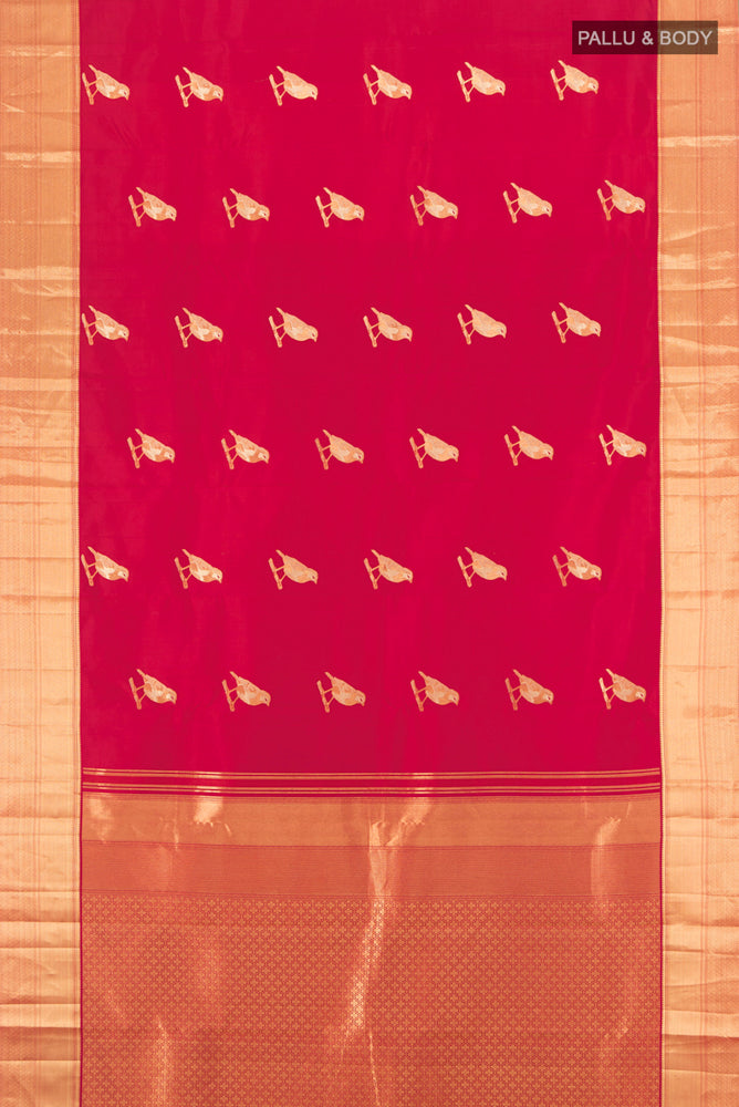 Flat view of Pure Silk Pure Zari Peach Kanchipuram Saree with Zari Butta on the body and Silk Border. 